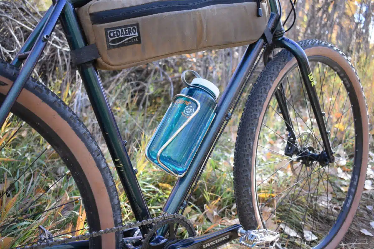 Widefoot LiterCage holding Nalgene with half frame bag